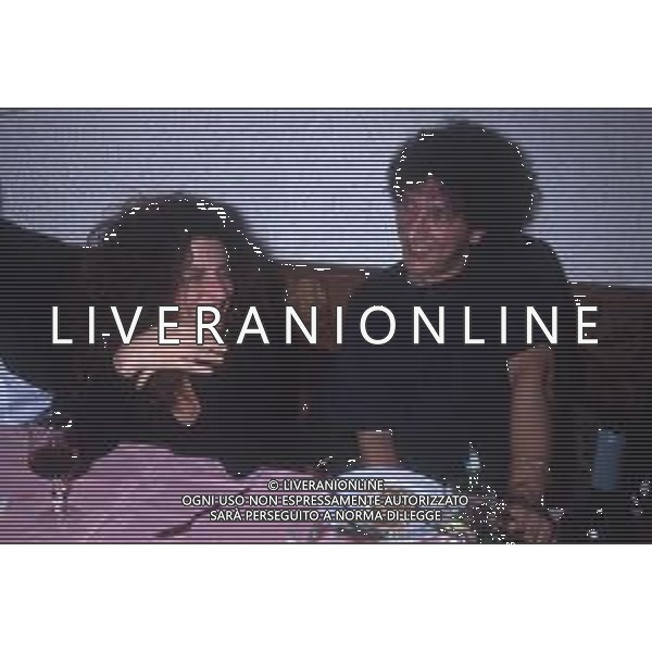 DIAP-RETROSPETTIVA EUGENIO BENNATO CANTANTE NELLA FOTO EUGENIO BENNATO A SANREMO NELL\'ANNO 1992 CON PIETRA MONTECORVINO AG ALDO LIVERANI SAS