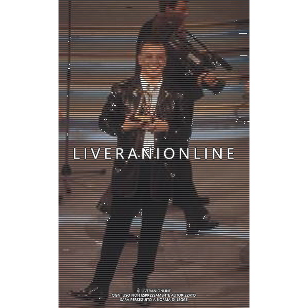 DIAP-RETROSPETTIVA ENRICO RUGGERI CANTANTE NELLA FOTO ENRICO RUGGERI AL FESTIVAL DI SANREMO NELL\'ANNO 1993 AG ALDO LIVERANI SAS