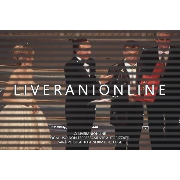 DIAP-RETROSPETTIVA ENRICO RUGGERI CANTANTE NELLA FOTO ENRICO RUGGERI AL FESTIVAL DI SANREMO NELL\'ANNO 1993 CON LORELLA CUCCARINI E PIPPO BAUDO AG ALDO LIVERANI SAS