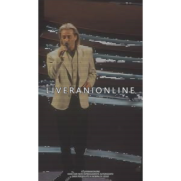 DIAP-RETROSPETTIVA AMEDEO MINGHI CANTANTE NELLA FOTO AMEDEO MINGHI A SANREMO NELL\'ANNO 1992 AG ALDO LIVERANI SAS
