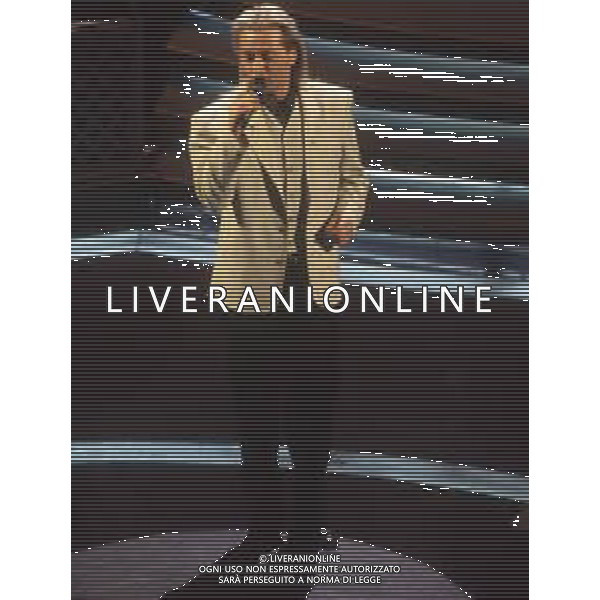 DIAP-RETROSPETTIVA AMEDEO MINGHI CANTANTE NELLA FOTO AMEDEO MINGHI A SANREMO NELL\'ANNO 1992 AG ALDO LIVERANI SAS