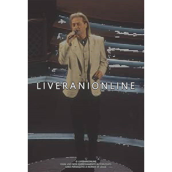 DIAP-RETROSPETTIVA AMEDEO MINGHI CANTANTE NELLA FOTO AMEDEO MINGHI A SANREMO NELL\'ANNO 1992 AG ALDO LIVERANI SAS