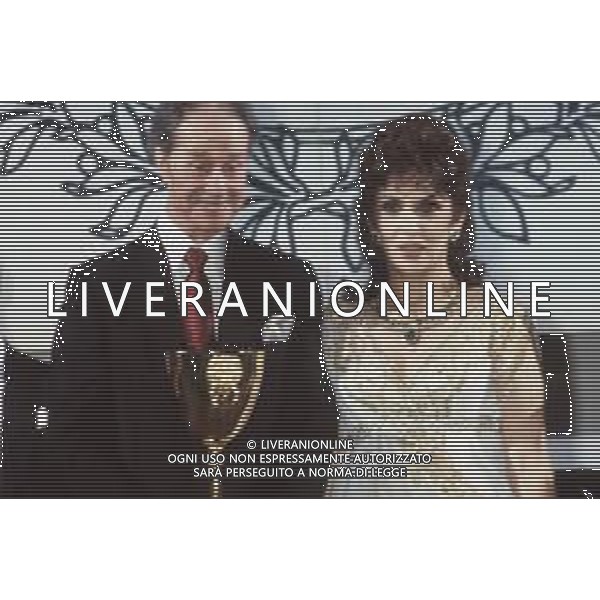DIAP-RETROSPETTIVA DON AMECHE ATTORE NELLA FOTO DON AMECHE A VENEZIA NELL\'ANNO 1988 CON GINA LOLLOBRIGIDA AG ALDO LIVERANI SAS