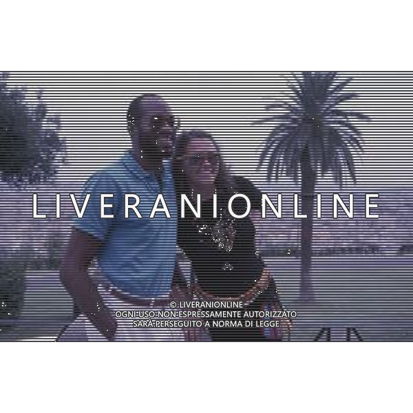 DIAP-RETROSPETTIVA EDWIN MOSES ATLETA NELLA FOTO EDWIN MOSES CON LA MOGLIE MIRELLA A ROMA AI MONIALI DI ATLETICA NELL\'ANNO 1987 AG ALDO LIVERANI SAS