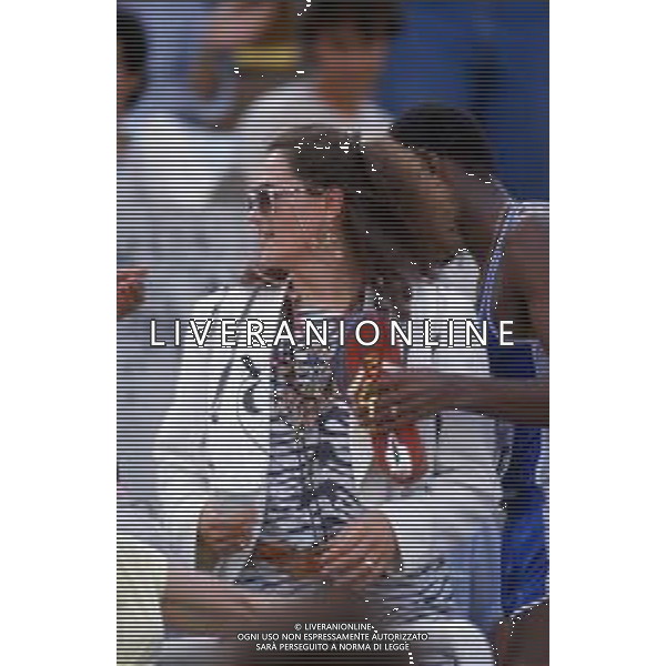 DIAP-RETROSPETTIVA EDWIN MOSES ATLETA NELLA FOTO EDWIN MOSES CON LA MOGLIE MIRELLA A ROMA AI MONIALI DI ATLETICA NELL\'ANNO 1987 AG ALDO LIVERANI SAS