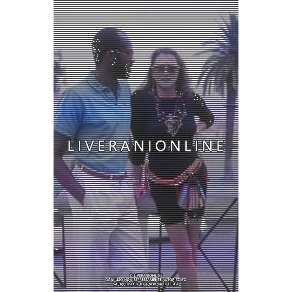 DIAP-RETROSPETTIVA EDWIN MOSES ATLETA NELLA FOTO EDWIN MOSES CON LA MOGLIE MIRELLA A ROMA AI MONIALI DI ATLETICA NELL\'ANNO 1987 AG ALDO LIVERANI SAS
