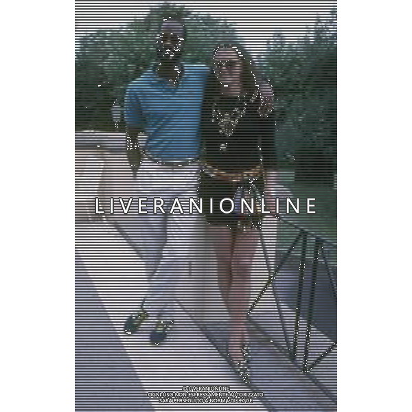 DIAP-RETROSPETTIVA EDWIN MOSES ATLETA NELLA FOTO EDWIN MOSES CON LA MOGLIE MIRELLA A ROMA AI MONIALI DI ATLETICA NELL\'ANNO 1987 AG ALDO LIVERANI SAS