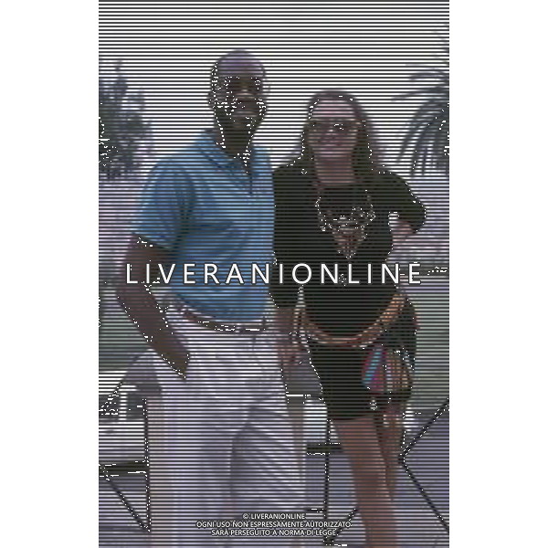 DIAP-RETROSPETTIVA EDWIN MOSES ATLETA NELLA FOTO EDWIN MOSES CON LA MOGLIE MIRELLA A ROMA AI MONIALI DI ATLETICA NELL\'ANNO 1987 AG ALDO LIVERANI SAS