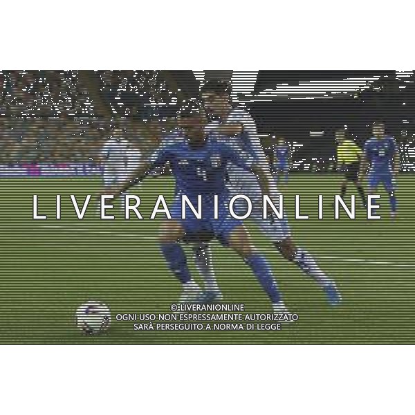 Leonardo Spinazzola of Italy battle for the ball with Roy Revivo of Israel during Italy vs Israel, European Qualifier, Group I, matchday 8, game at Bluenergy stadium in Udine (UD), Italy, on October 14, 2025. (Photo by Davide Casentini) ©TVDC Casentini Davide - AGENZIA ALDO LIVERANI SAS