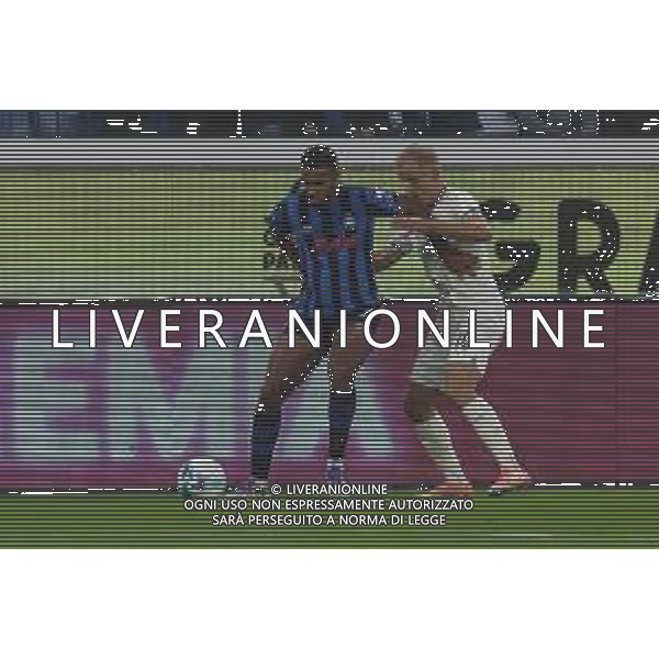 Isak Hien of Atalanta BC battle for the ball with Gustav Isaksen of SS Lazio during Atalanta BC vs SS Lazio, 7° Serie A Enilive 2025-26 game at New Balance arena in Bergamo (BG), Italy, on October 19, 2025. (Photo by Davide Casentini) AG ALDO LIVERANI SAS