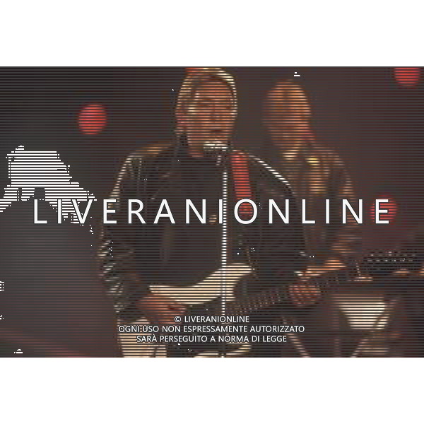 DIAP-RETROSPETTIVA CHRIS REA CANTANTE NELLA FOTO CHRIS REA A SANREMO NELL\'ANNO 1989 AG ALDO LIVERANI SAS