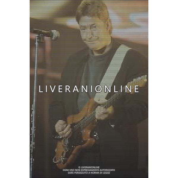 DIAP-RETROSPETTIVA CHRIS REA CANTANTE NELLA FOTO CHRIS REA A SANREMO NELL\'ANNO 1989 AG ALDO LIVERANI SAS