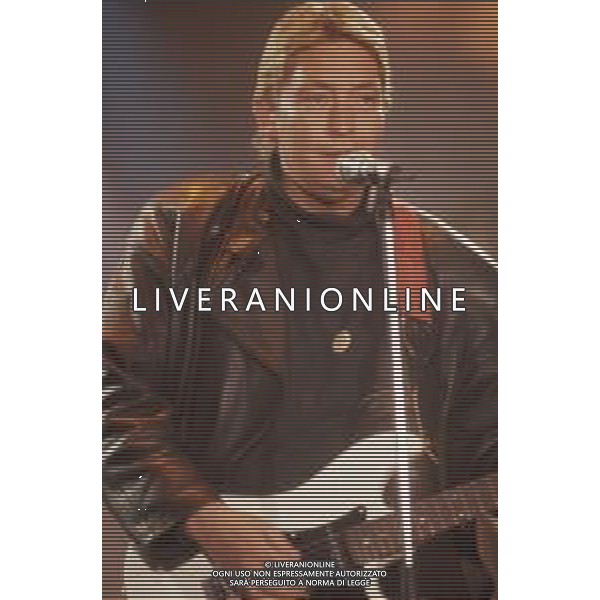 DIAP-RETROSPETTIVA CHRIS REA CANTANTE NELLA FOTO CHRIS REA A SANREMO NELL\'ANNO 1989 AG ALDO LIVERANI SAS