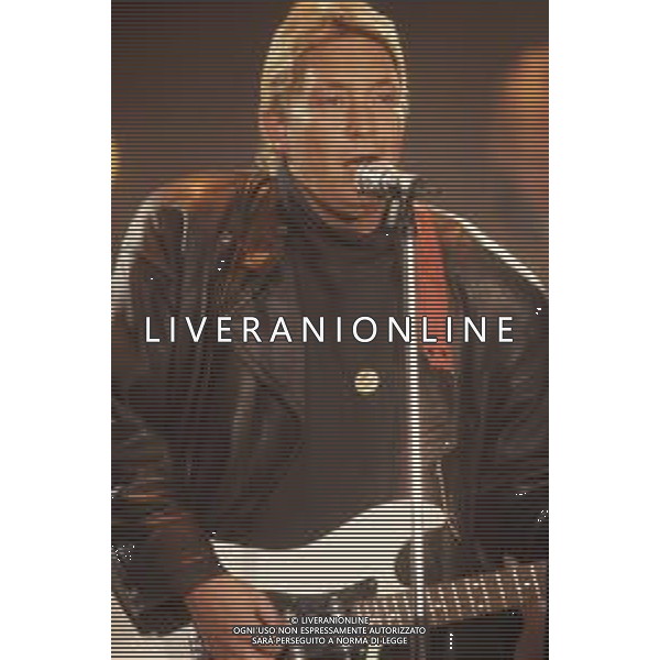DIAP-RETROSPETTIVA CHRIS REA CANTANTE NELLA FOTO CHRIS REA A SANREMO NELL\'ANNO 1989 AG ALDO LIVERANI SAS