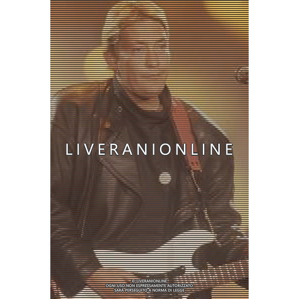 DIAP-RETROSPETTIVA CHRIS REA CANTANTE NELLA FOTO CHRIS REA A SANREMO NELL\'ANNO 1989 AG ALDO LIVERANI SAS