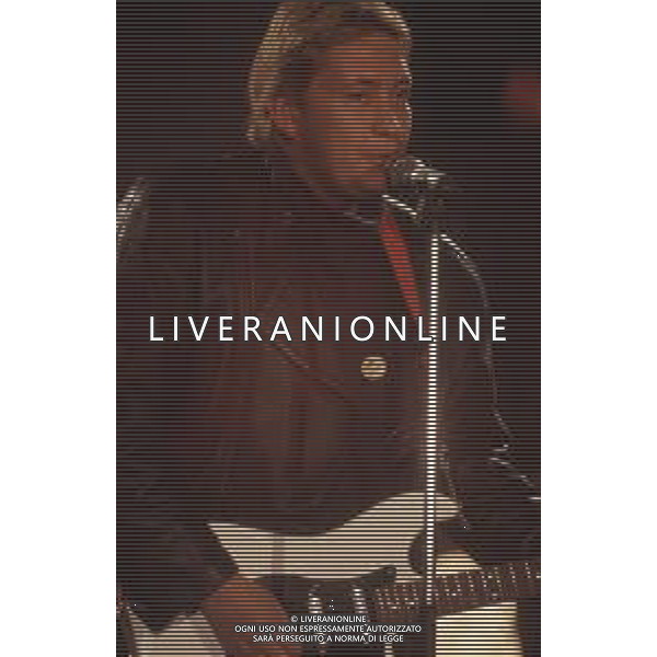 DIAP-RETROSPETTIVA CHRIS REA CANTANTE NELLA FOTO CHRIS REA A SANREMO NELL\'ANNO 1989 AG ALDO LIVERANI SAS