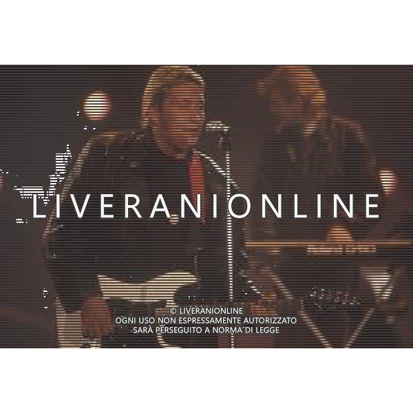 DIAP-RETROSPETTIVA CHRIS REA CANTANTE NELLA FOTO CHRIS REA A SANREMO NELL\'ANNO 1989 AG ALDO LIVERANI SAS