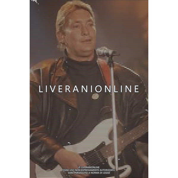 DIAP-RETROSPETTIVA CHRIS REA CANTANTE NELLA FOTO CHRIS REA A SANREMO NELL\'ANNO 1989 AG ALDO LIVERANI SAS