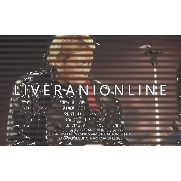 DIAP-RETROSPETTIVA CHRIS REA CANTANTE NELLA FOTO CHRIS REA A SANREMO NELL\'ANNO 1989 AG ALDO LIVERANI SAS