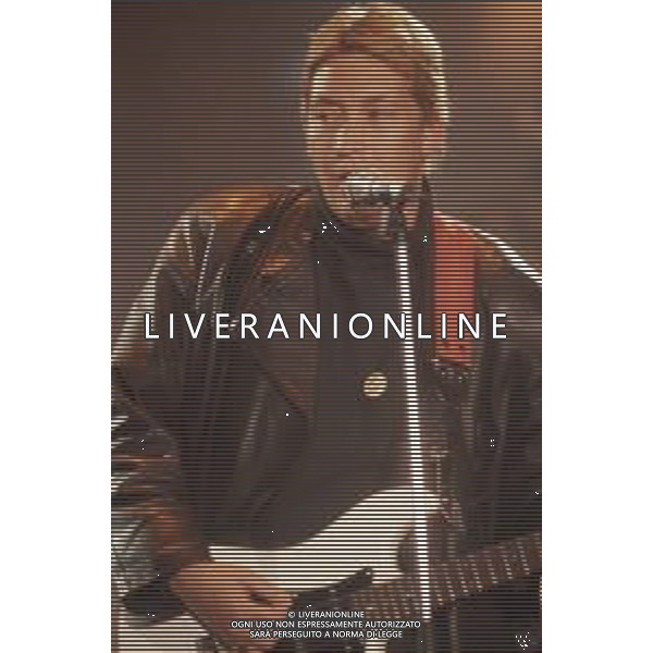 DIAP-RETROSPETTIVA CHRIS REA CANTANTE NELLA FOTO CHRIS REA A SANREMO NELL\'ANNO 1989 AG ALDO LIVERANI SAS