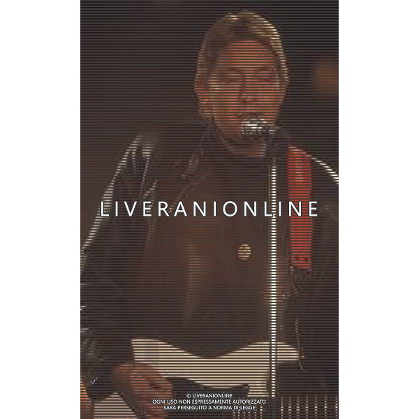 DIAP-RETROSPETTIVA CHRIS REA CANTANTE NELLA FOTO CHRIS REA A SANREMO NELL\'ANNO 1989 AG ALDO LIVERANI SAS