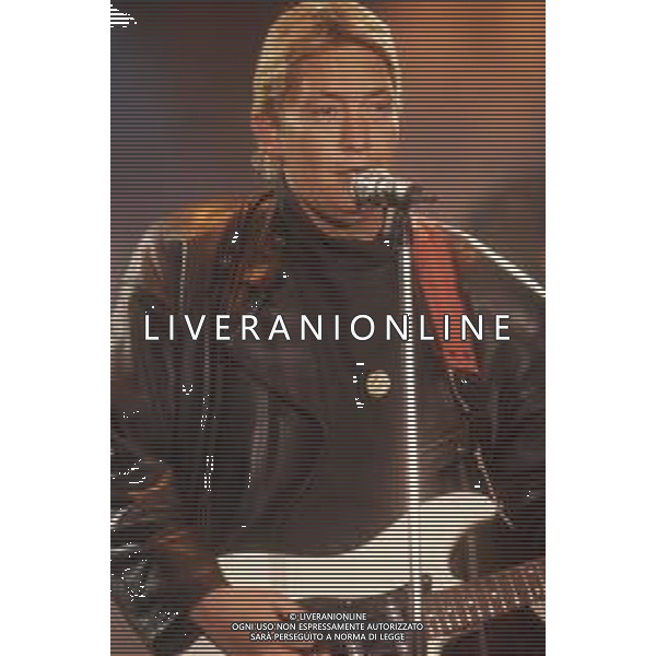 DIAP-RETROSPETTIVA CHRIS REA CANTANTE NELLA FOTO CHRIS REA A SANREMO NELL\'ANNO 1989 AG ALDO LIVERANI SAS