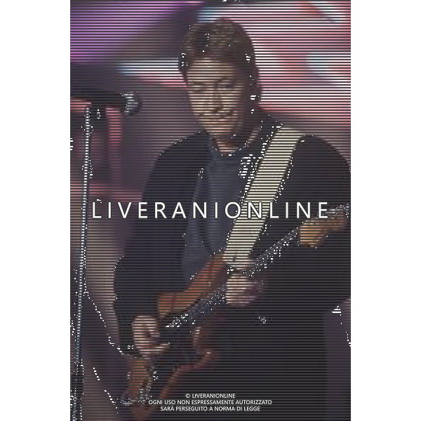 DIAP-RETROSPETTIVA CHRIS REA CANTANTE NELLA FOTO CHRIS REA A SANREMO NELL\'ANNO 1989 AG ALDO LIVERANI SAS