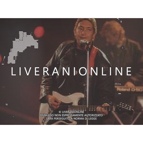 DIAP-RETROSPETTIVA CHRIS REA CANTANTE NELLA FOTO CHRIS REA A SANREMO NELL\'ANNO 1989 AG ALDO LIVERANI SAS