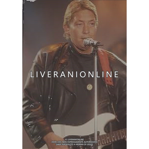 DIAP-RETROSPETTIVA CHRIS REA CANTANTE NELLA FOTO CHRIS REA A SANREMO NELL\'ANNO 1989 AG ALDO LIVERANI SAS