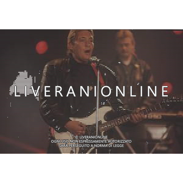 DIAP-RETROSPETTIVA CHRIS REA CANTANTE NELLA FOTO CHRIS REA A SANREMO NELL\'ANNO 1989 AG ALDO LIVERANI SAS