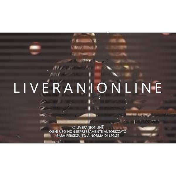 DIAP-RETROSPETTIVA CHRIS REA CANTANTE NELLA FOTO CHRIS REA A SANREMO NELL\'ANNO 1989 AG ALDO LIVERANI SAS