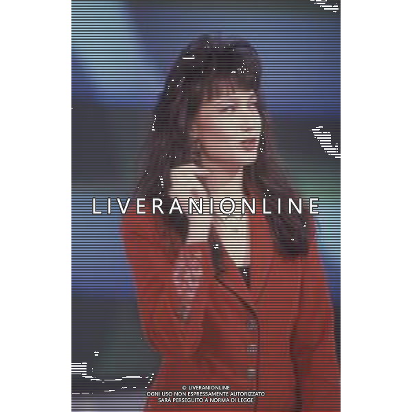 DIAP-RETROSPETTIVA KAY SANDWIK CONDUTTRICE TELEVISIVA E RADIOFONICA NELLA FOTO KAY SANDWIK CONDUCE LA TRASMISSIONE “PRESSING“ NELL\'ANNO 1990 AG ALDO LIVERANI SAS