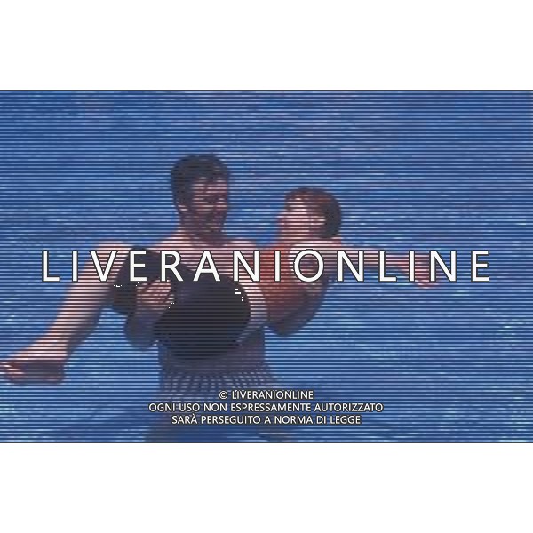 DIAP-RETROSPETTIVA SYUSY BLADY CONDUTTRICE TELEVISIVA NELLA FOTO SYUSY BLADY CON PATRIZIO ROVERSI NELL\'ANNO 1987 AG ALDO LIVERANI SAS 