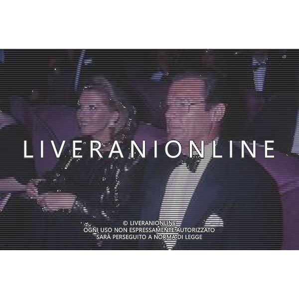 DIAP-RETROSPETTIVA ROGER MOORE ATTORE NELLA FOTO ROGER MOORE CON LA MOGLIE LUISA MATTIOLI A CANNES NELL\'ANNO 1989 AG ALDO LIVERANI SAS