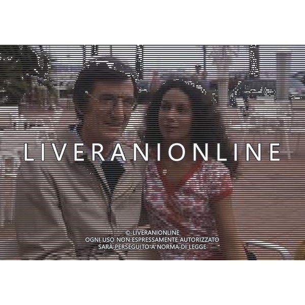 DIAP-RETROSPETTIVA CARLO LIZZANI REGISTA NELLA FOTO CARLO LIZZANI REGISTA A CANNES NELL\'ANNO 1983 CON BEATRICE ROMANO AG ALDO LIVERANI SAS  