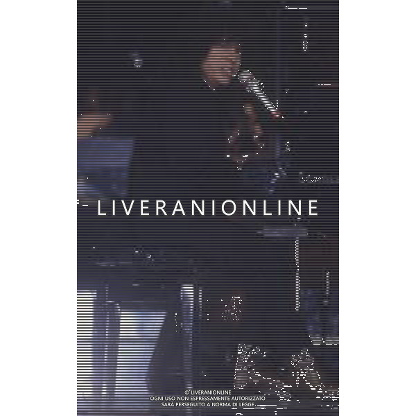 DIAP-RETROSPETTIVA RICCARDO COCCIANTE CANTANTE NELLA FOTO RICCARDO COCCIANTE AL FESTIVAL DI SANREMO NELL\'ANNO 1991 AG ALDO LIVERANI SAS