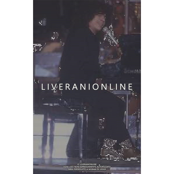DIAP-RETROSPETTIVA RICCARDO COCCIANTE CANTANTE NELLA FOTO RICCARDO COCCIANTE AL FESTIVAL DI SANREMO NELL\'ANNO 1991 AG ALDO LIVERANI SAS