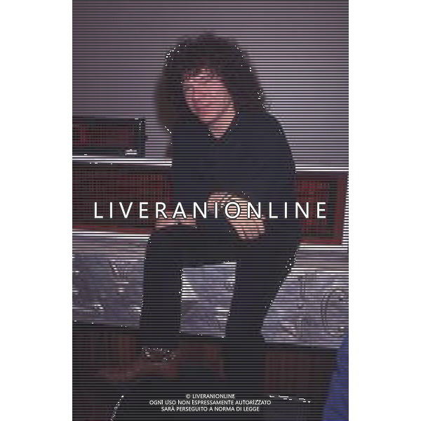 DIAP-RETROSPETTIVA RICCARDO COCCIANTE CANTANTE NELLA FOTO RICCARDO COCCIANTE AL FESTIVAL DI SANREMO NELL\'ANNO 1991 AG ALDO LIVERANI SAS