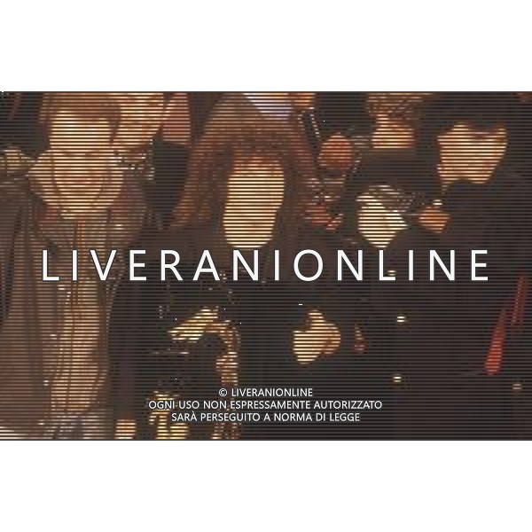 DIAP-RETROSPETTIVA RICCARDO COCCIANTE CANTANTE NELLA FOTO RICCARDO COCCIANTE AL FESTIVAL DI SANREMO NELL\'ANNO 1991 CON MARCO MASINI E RENATO ZERO AG ALDO LIVERANI SAS