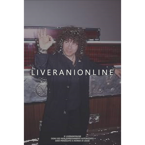 DIAP-RETROSPETTIVA RICCARDO COCCIANTE CANTANTE NELLA FOTO RICCARDO COCCIANTE AL FESTIVAL DI SANREMO NELL\'ANNO 1991 AG ALDO LIVERANI SAS