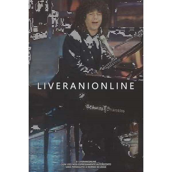 DIAP-RETROSPETTIVA RICCARDO COCCIANTE CANTANTE NELLA FOTO RICCARDO COCCIANTE AL FESTIVAL DI SANREMO NELL\'ANNO 1991 AG ALDO LIVERANI SAS
