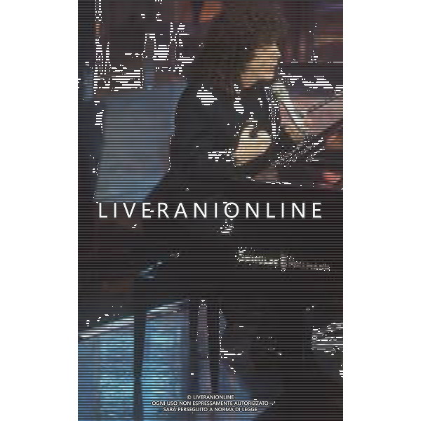 DIAP-RETROSPETTIVA RICCARDO COCCIANTE CANTANTE NELLA FOTO RICCARDO COCCIANTE AL FESTIVAL DI SANREMO NELL\'ANNO 1991 AG ALDO LIVERANI SAS