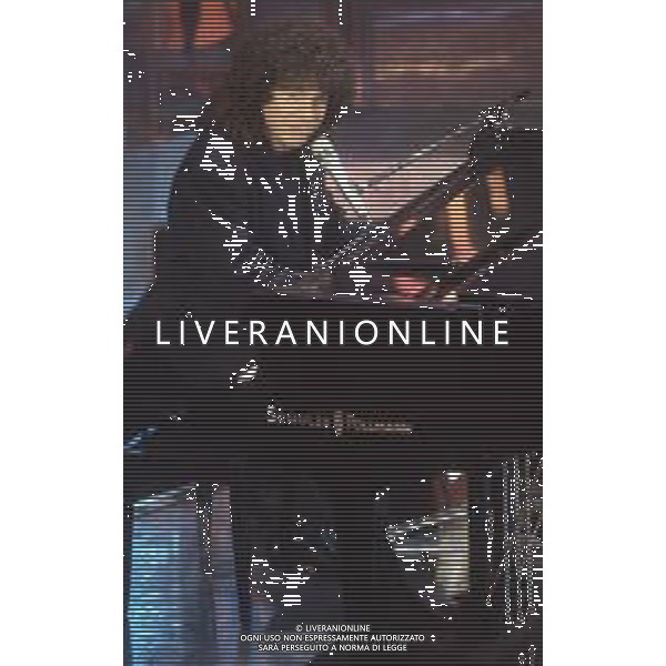DIAP-RETROSPETTIVA RICCARDO COCCIANTE CANTANTE NELLA FOTO RICCARDO COCCIANTE AL FESTIVAL DI SANREMO NELL\'ANNO 1991 AG ALDO LIVERANI SAS