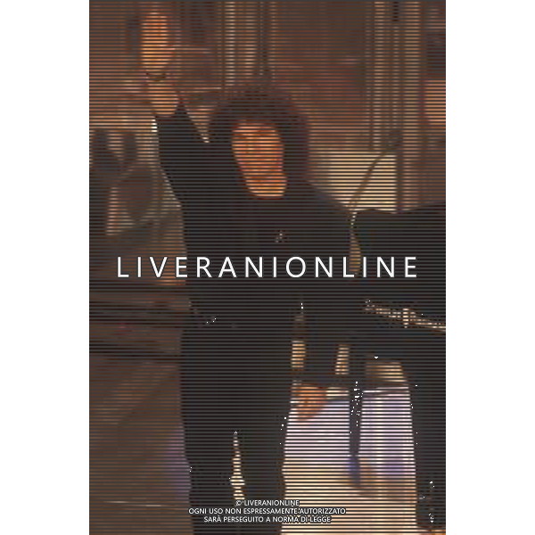 DIAP-RETROSPETTIVA RICCARDO COCCIANTE CANTANTE NELLA FOTO RICCARDO COCCIANTE AL FESTIVAL DI SANREMO NELL\'ANNO 1991 AG ALDO LIVERANI SAS
