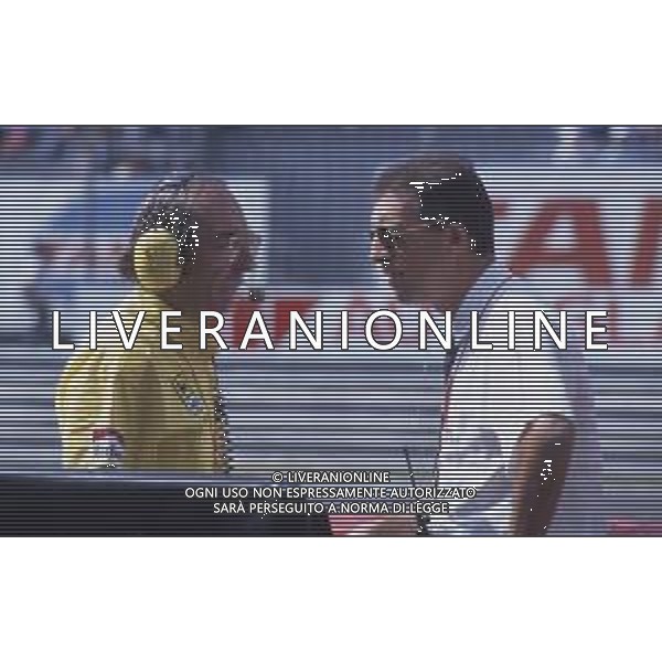 DIAP-RETROSPETTIVA CLAUDIO LOMBARDI INGEGNERE FERRARI F1 NELLA FOTO CLAUDIO LOMBARDI INGEGNERE DELLA SCUDERIA FERRARI F1 ANNO 1991 CON PIERO LARDI FERRARI AG ALDO LIVERANI SAS