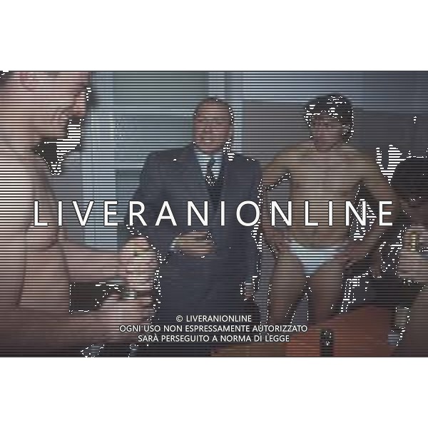 DIAP-RETROSPETTIVA SILVIO BERLUSCONI PRESIDENTE MILAN E PRESIDENTE RUGBY MEDIOLANUM NELLA FOTO SILVIO BERLUSCONI A MILANO NELL\'ANNO 1991-1992 IN VISITA ALLA SQUADRA DI RUGBY AG ALDO LIVERANI SAS