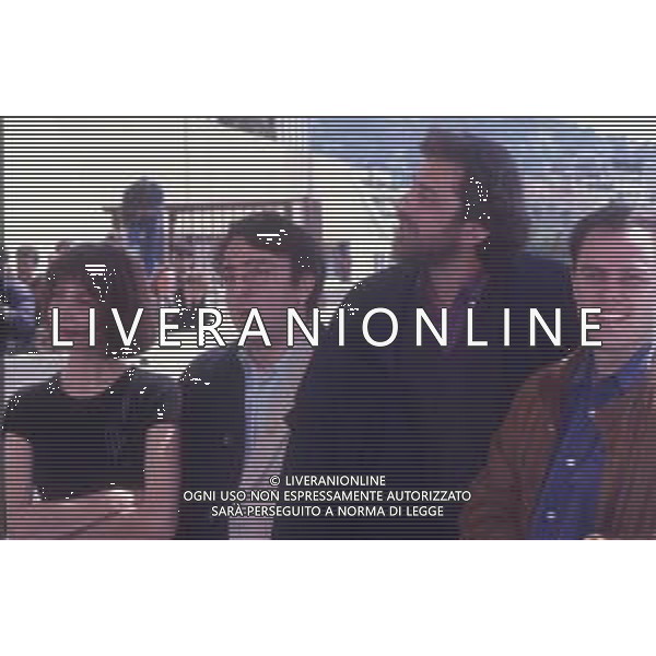 DIAP-RETROSPETTIVA ANN ROUSSELL ATTRICE NELLA FOTO ANN ROUSSELL A CANNES NELL\'ANNO 1991 CON SILVIO ORLANDO-NANNI MORETTI CAST DEL FILM “IL PORTABORSE “ AG ALDO LIVERANI SAS