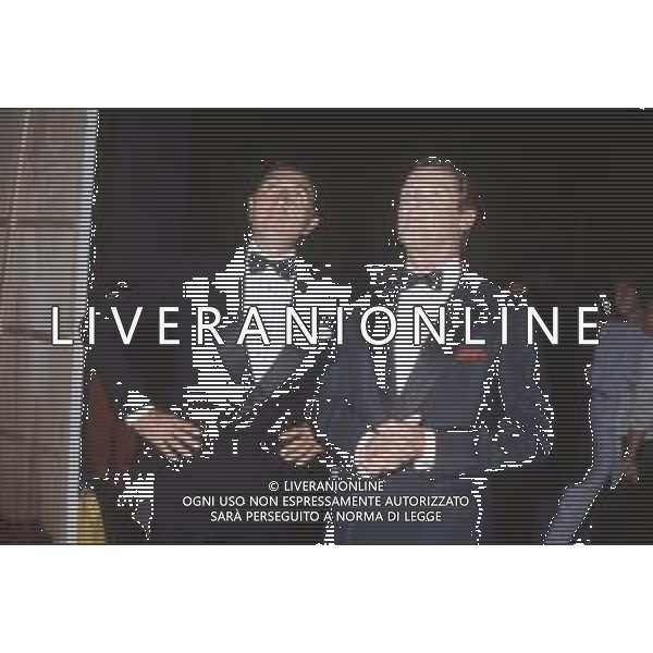 DIAP-RETROSPETTIVA ROGER MOORE ATTORE NELLA FOTO ROGER MOORE CON PIPPO BAUDO A ROMA NELL\'ANNO 1985 AG ALDO LIVERANI SAS