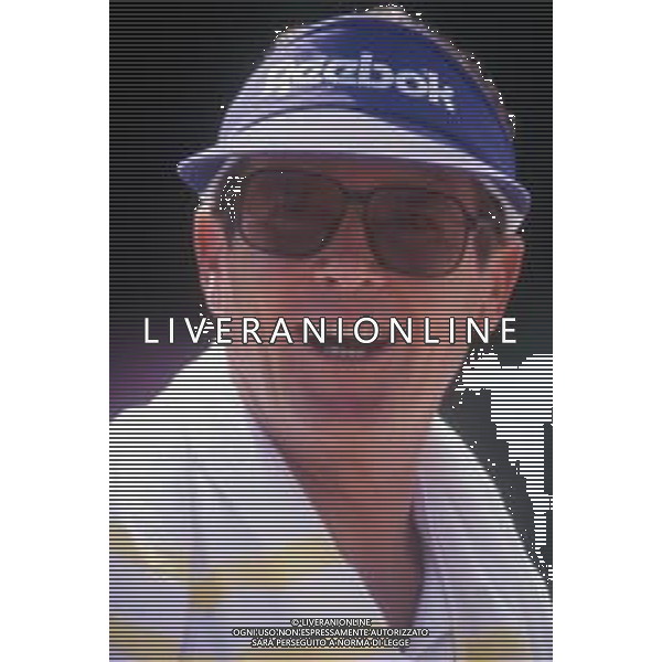 DIAP-RETROSPETTIVA ROGER MOORE ATTORE NELLA FOTO ROGER MOORE A MONTECARLO AL TORNEO DI TENNIS NELL\'ANNO 1988 AG ALDO LIVERANI SAS