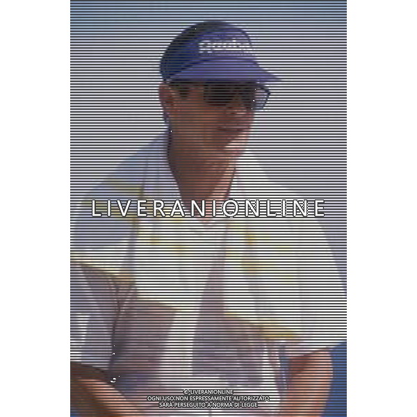 DIAP-RETROSPETTIVA ROGER MOORE ATTORE NELLA FOTO ROGER MOORE A MONTECARLO AL TORNEO DI TENNIS NELL\'ANNO 1988 AG ALDO LIVERANI SAS